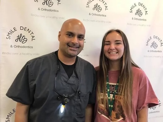 Dr. Subodh with a happy patient at Smile HB Dental and Orthodontics in Huntington Beach, CA